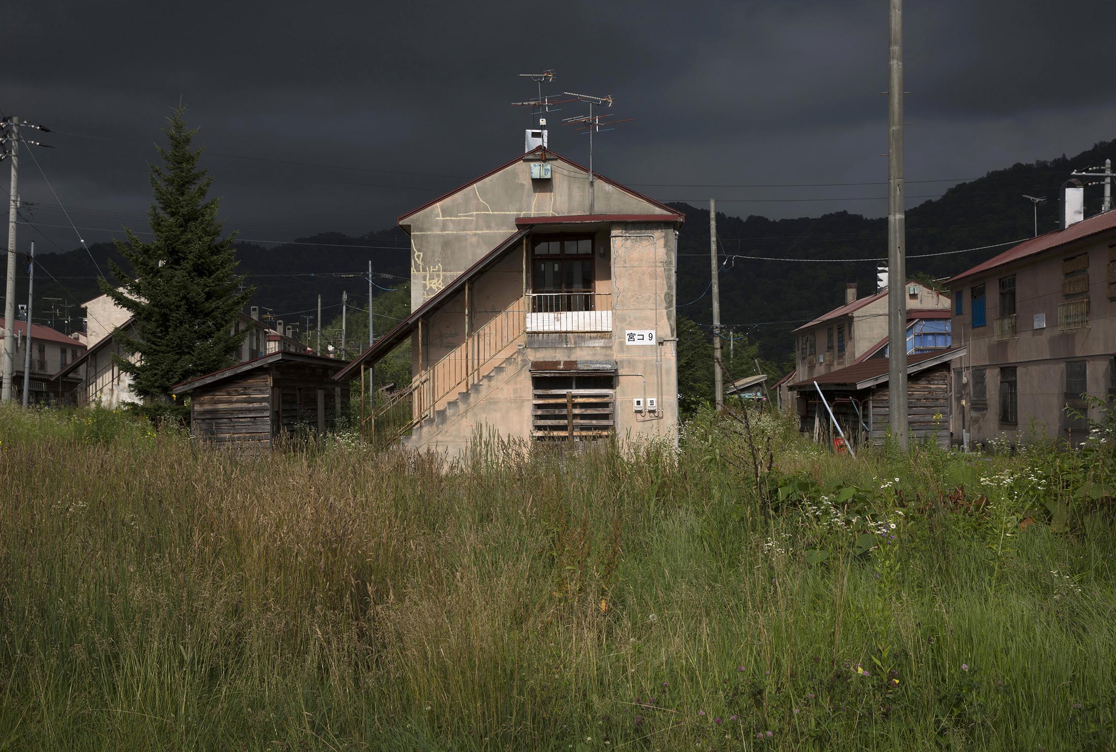 Apartment houses originally built for coal miners stand in Yubari, Hokkaido, Japan.

