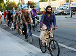 The partiers at the 2013 Santa Cruz Bike Party are balancing fine.