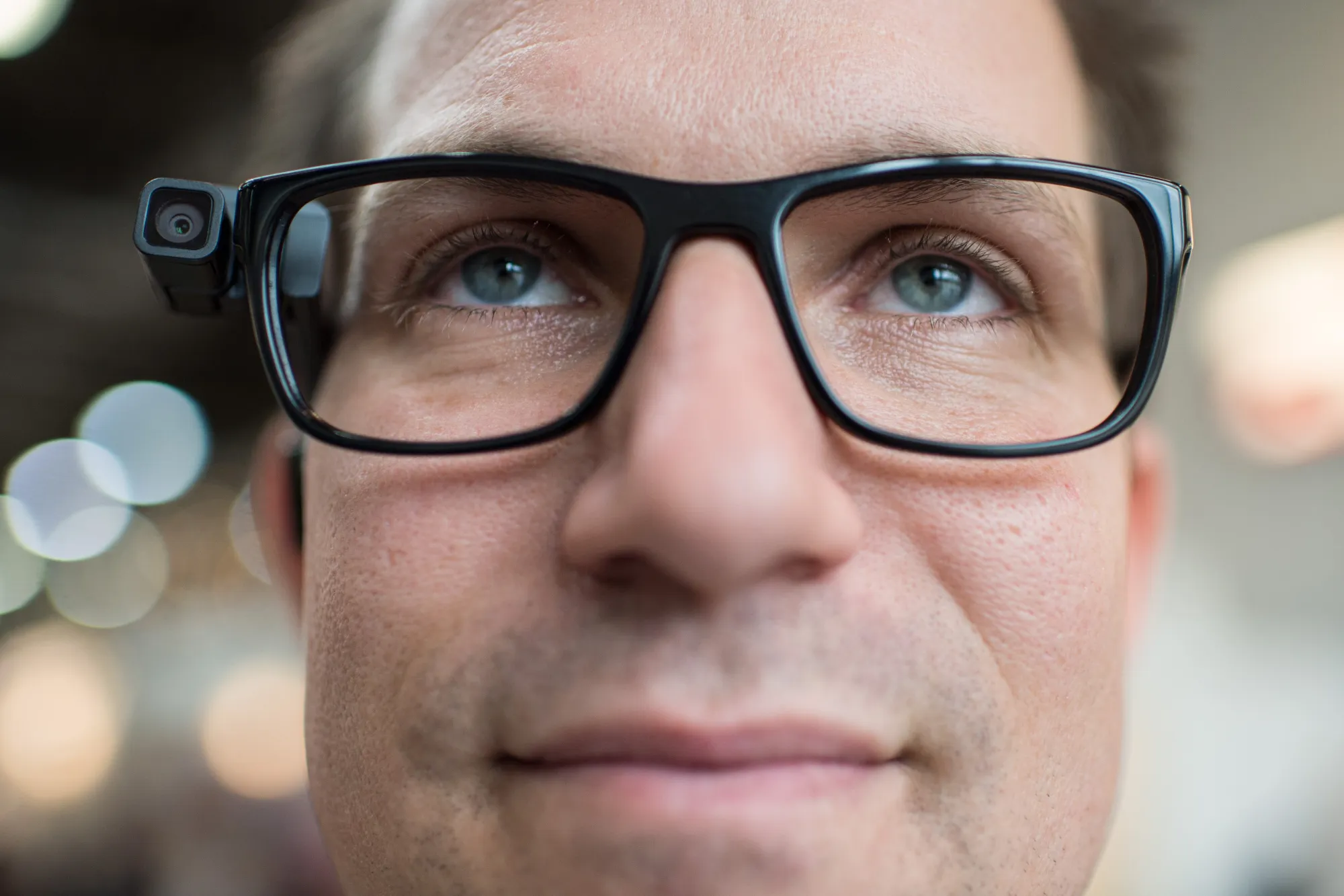 The ’OrCam’ device attached to a glasses.