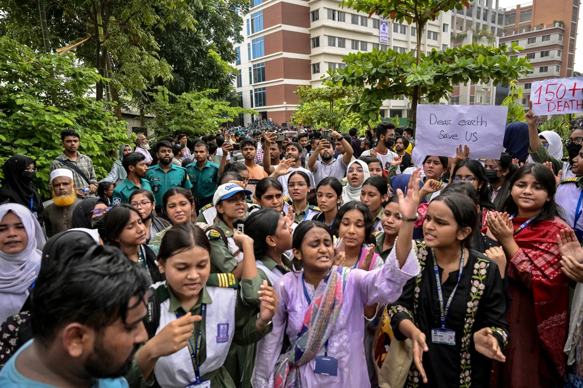 College students stage a protest&nbsp;a day after a military training jet crashed into their educational institution in Dhaka on July 22.