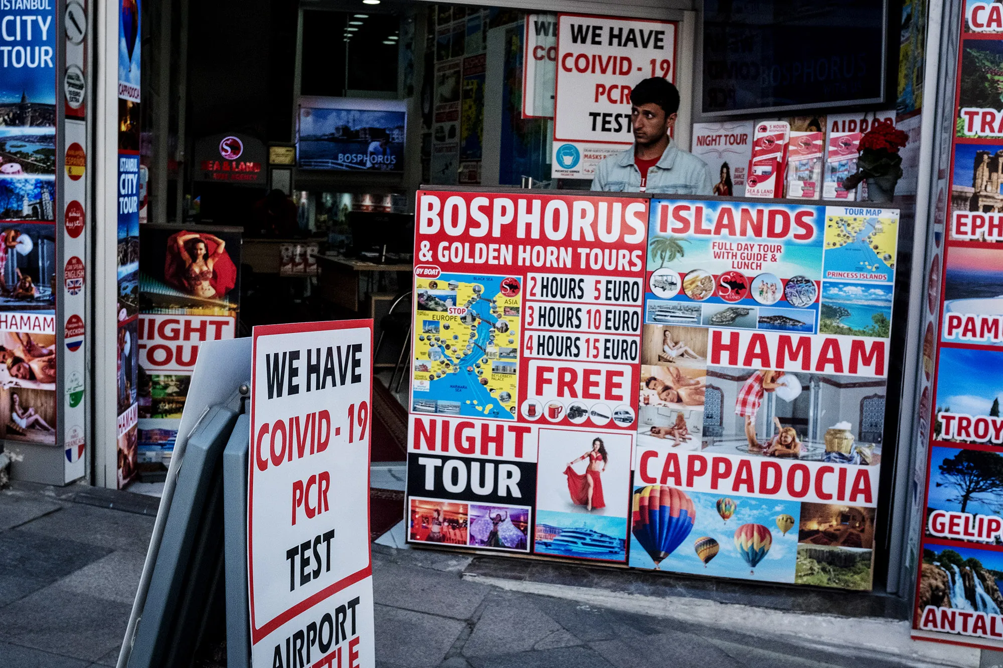 A man waits for customers at a tour shop offering PCR tests during a three week nationwide coronavirus lockdown in Istanbul, May. 5&nbsp;