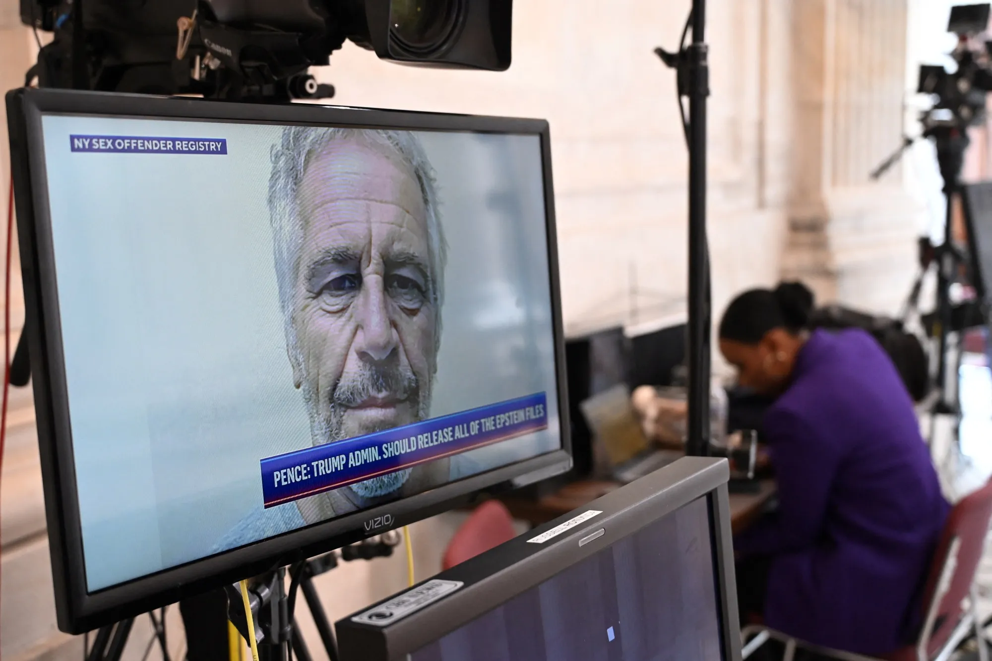 A photo of Jeffrey Epstein on a television screen at the US Capitol in Washington, DC, on July 16.