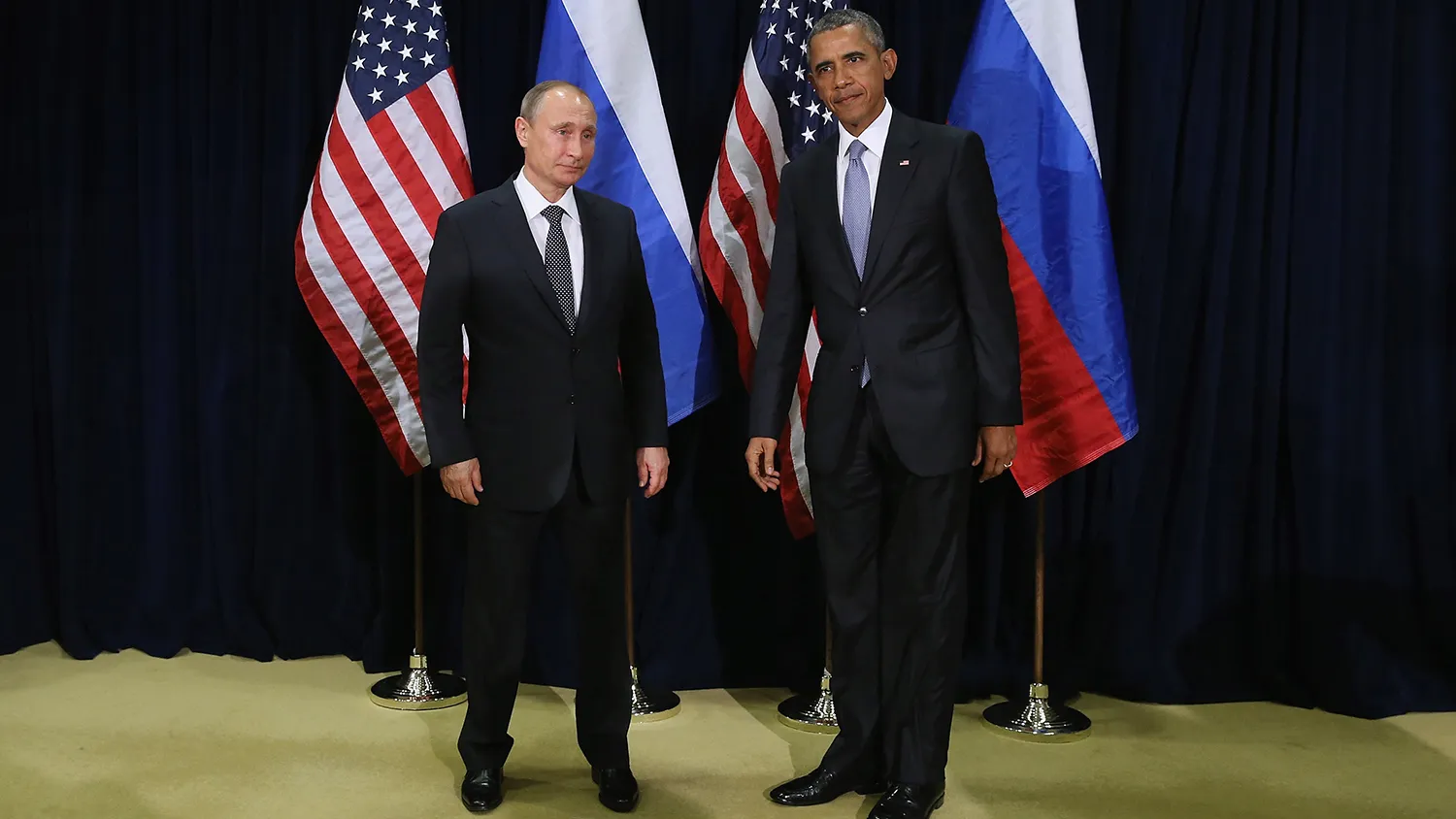 Russian President Vladimir Putin and U.S. President Barack Obama pose for photographs before the start of a bilateral meeting at the United Nations headquarters on Sept. 28, 2015, in New York City.

