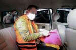 Juliari Peter Batubara outside court in Jakarta on Aug. 23.