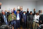 Arce, fourth from right, celebrates his win in La Paz on Oct. 19.