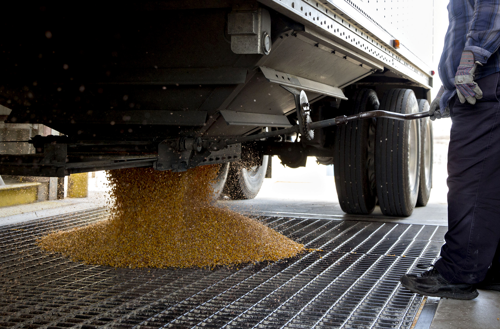 A truck driver unloads corn at the Archer-Daniels-Midland grain facility in Mendota, Illinois.