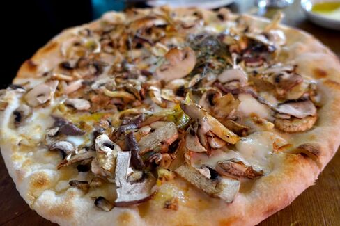 Pizza is served at Lardo.
