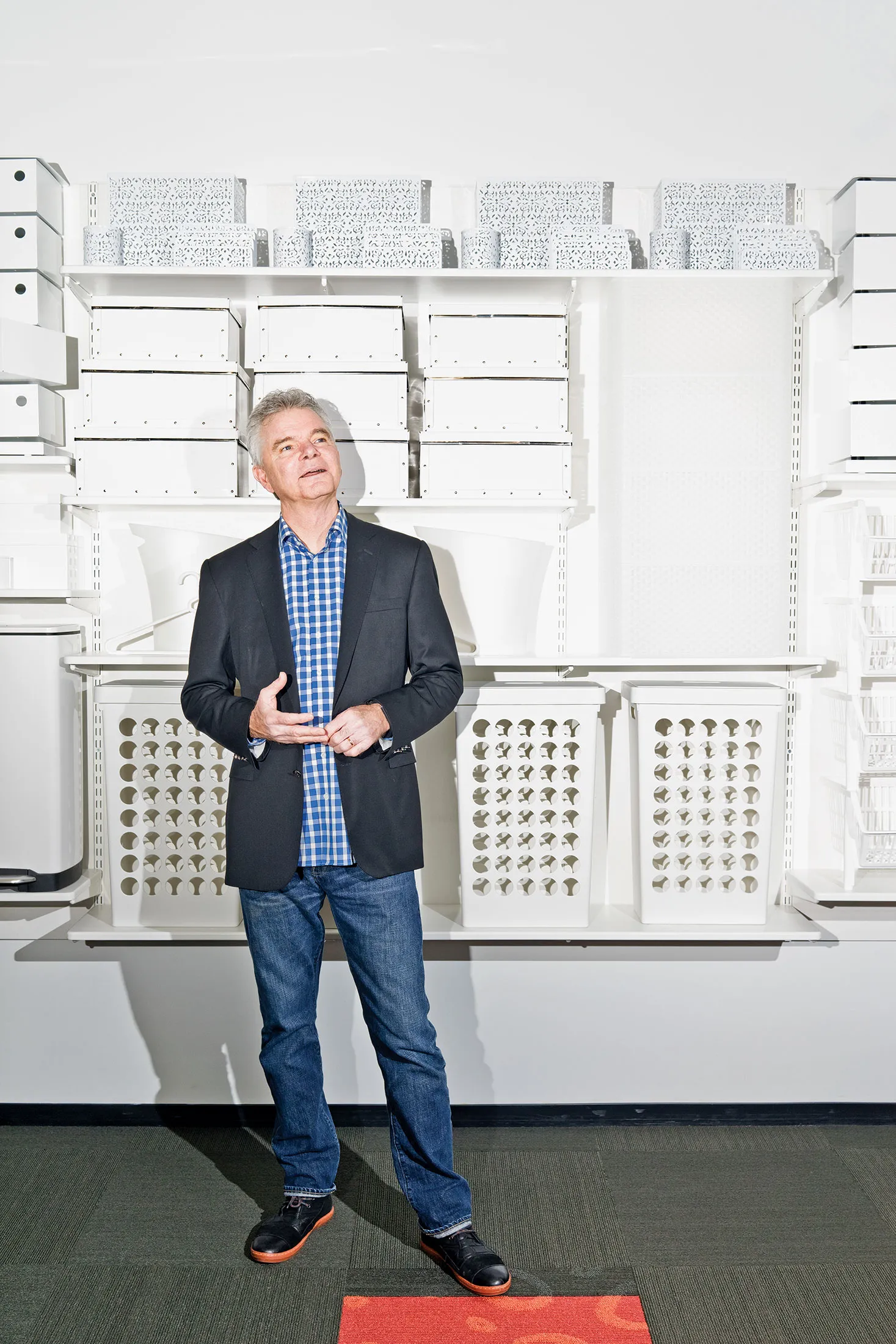 Tindell with his wares at company headquarters.
