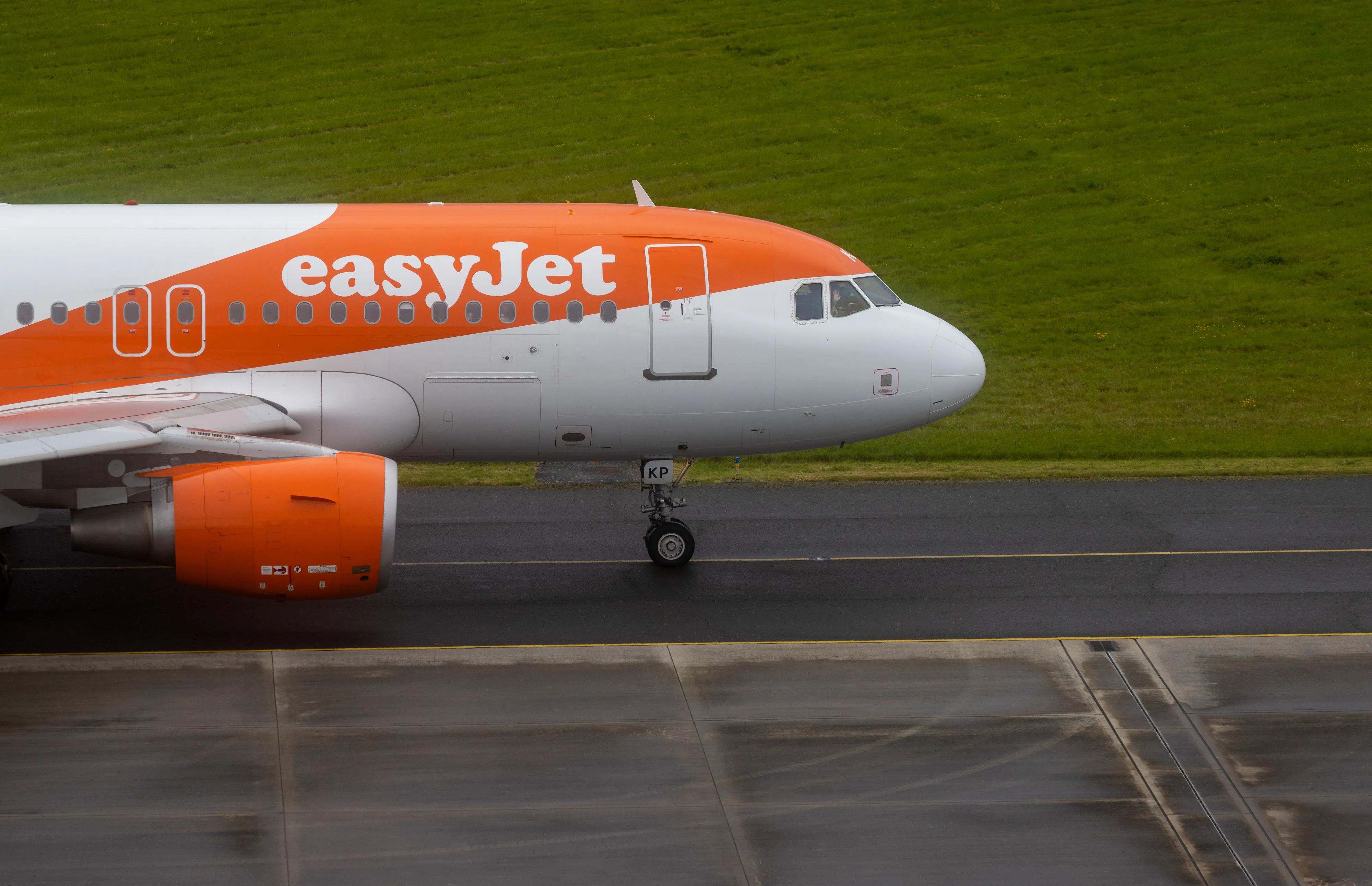 An EasyJet passenger aircraft taxis towards the runway at London Southend Airport in Southend-on-Sea, UK.