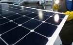 A worker inspects&nbsp;solar panels at&nbsp;manufacturing plant&nbsp;in California.