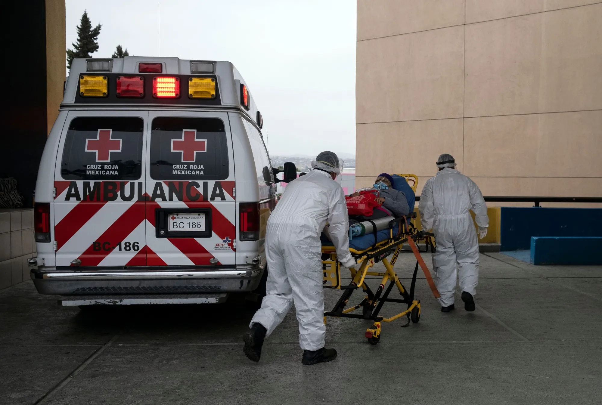 First responders transport a paitent with respiratory problems at the IMSS Hospital General Regional 1 in Tijuana, Baja California State, Mexico.