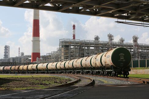 Freight cars filled with petroleum sit at a refining and petrochemical plant in Nizhenekamsk, Russia, on July 30, 2015.