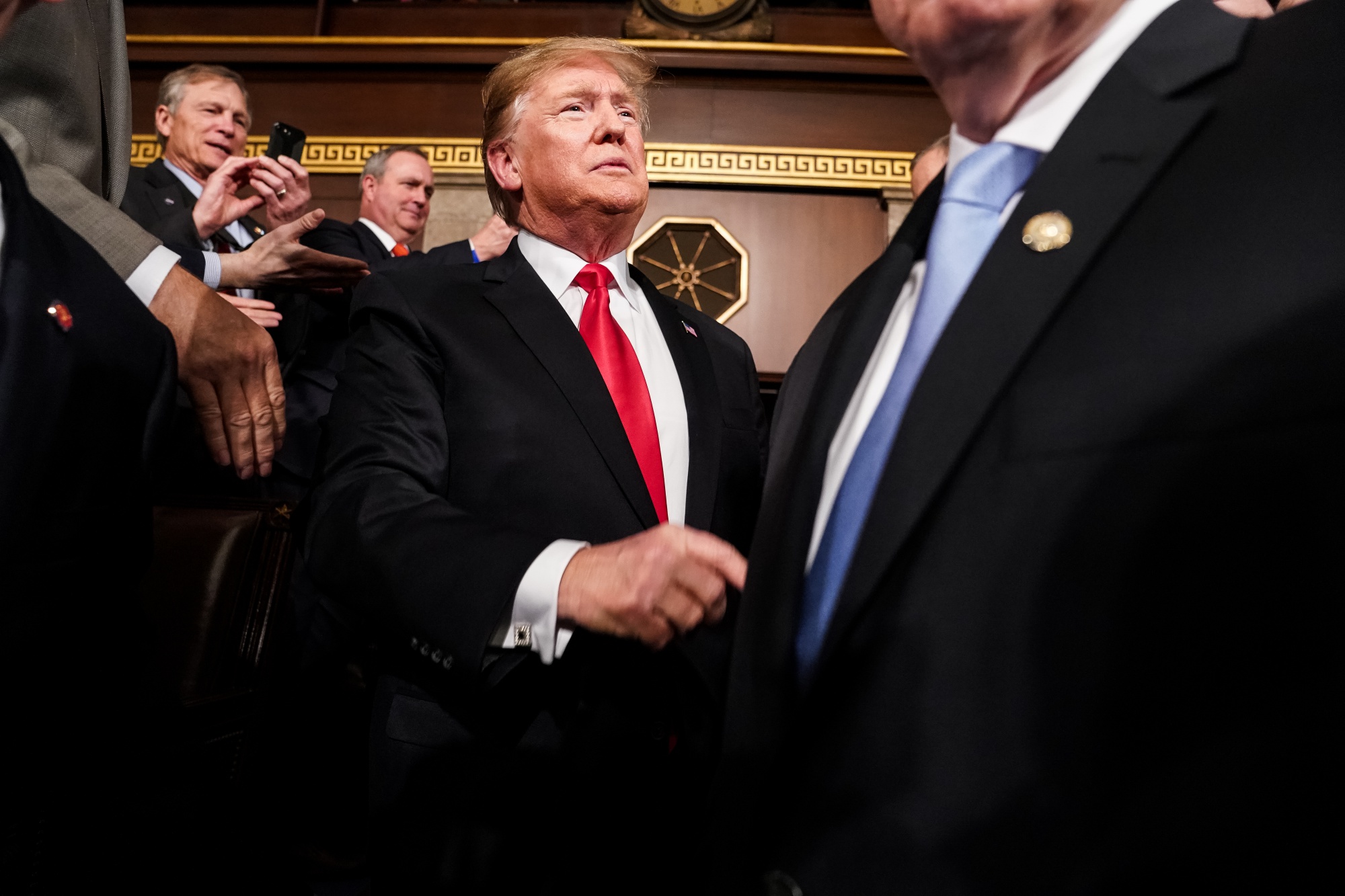 President Donald Trump arrives in the House chamber before he delivers a State of the Union address on Tuesday, Feb. 5, 2019.&nbsp;