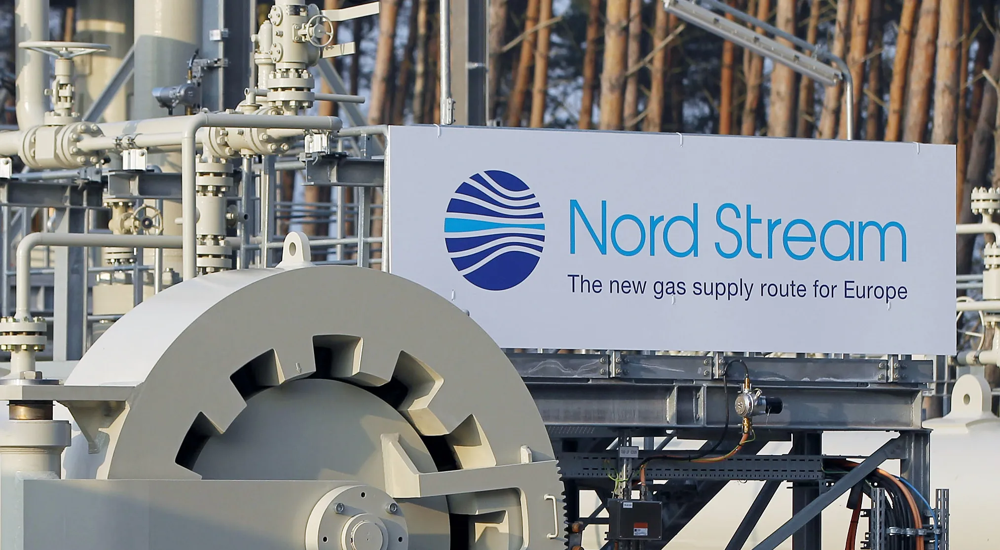 LUBMIN, GERMANY - NOVEMBER 08: A man wearing a hard hat walks by the central facility where the Nord Stream Baltic Sea gas pipeline reaches western Europe following the pipeline's official inauguration on November 8, 2011 in Lubmin, Germany.&nbsp;