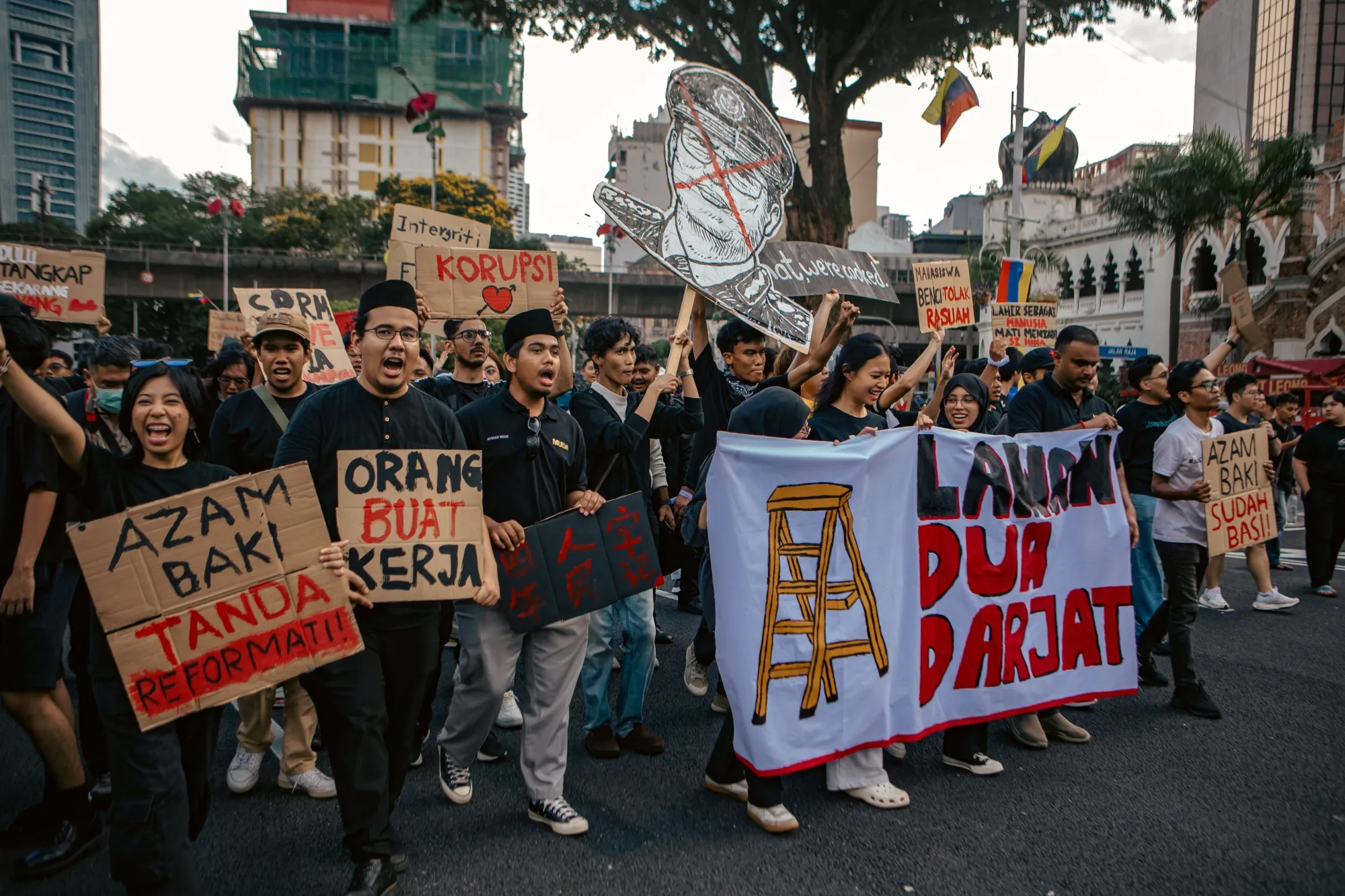 Protesters march during a demonstration against Malaysian Anti-Corruption Commission Chief Commissioner Azam Baki in Kuala Lumpur, Malaysia, on Feb. 15.