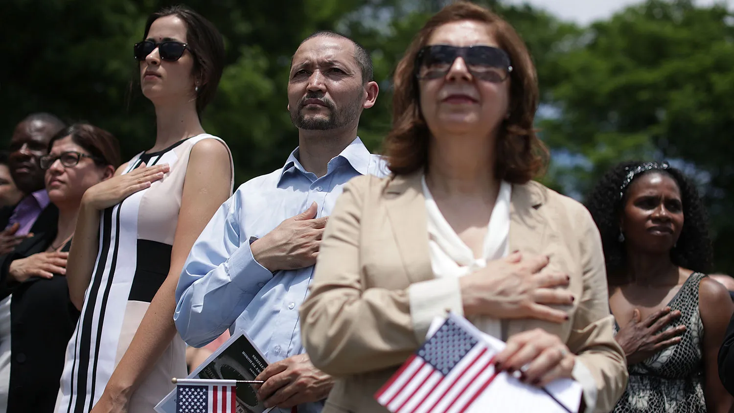 Newly naturalized citizens participate in a ceremony on June 2, 2016, at George Washington's Mount Vernon in Virginia.
