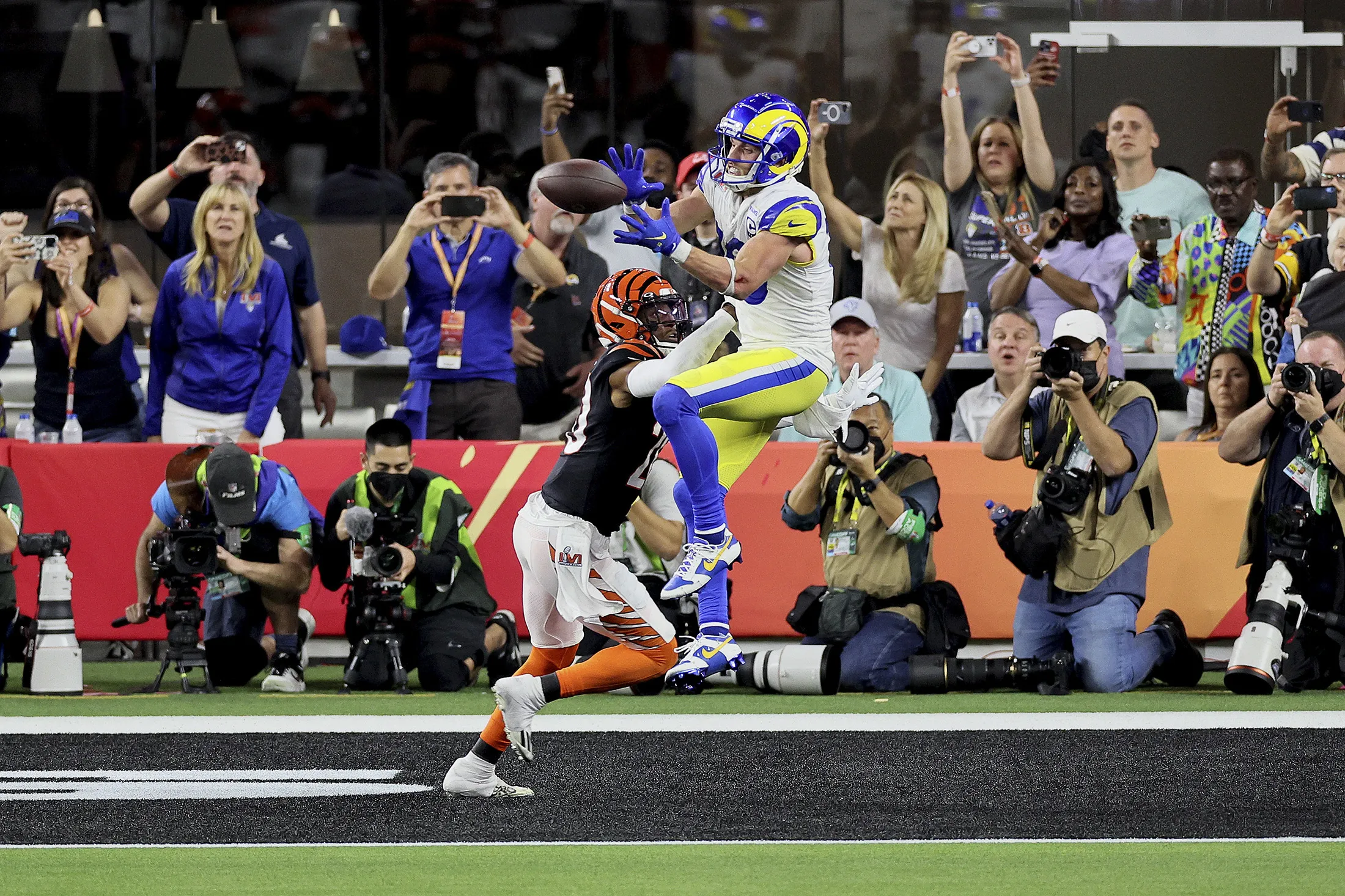 Cooper Kupp of the Los Angeles Rams makes a touchdown catch over Eli Apple of the Cincinnati Bengals during Super Bowl LVI at SoFi Stadium on Feb. 13.