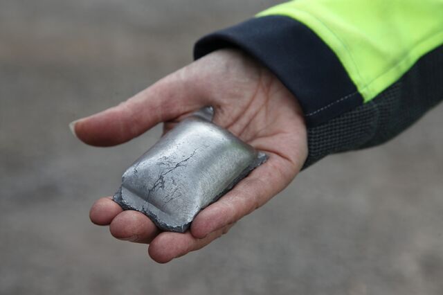 A small amount of sponge iron—the raw material for steel—is displayed by a worker in northern Sweden.