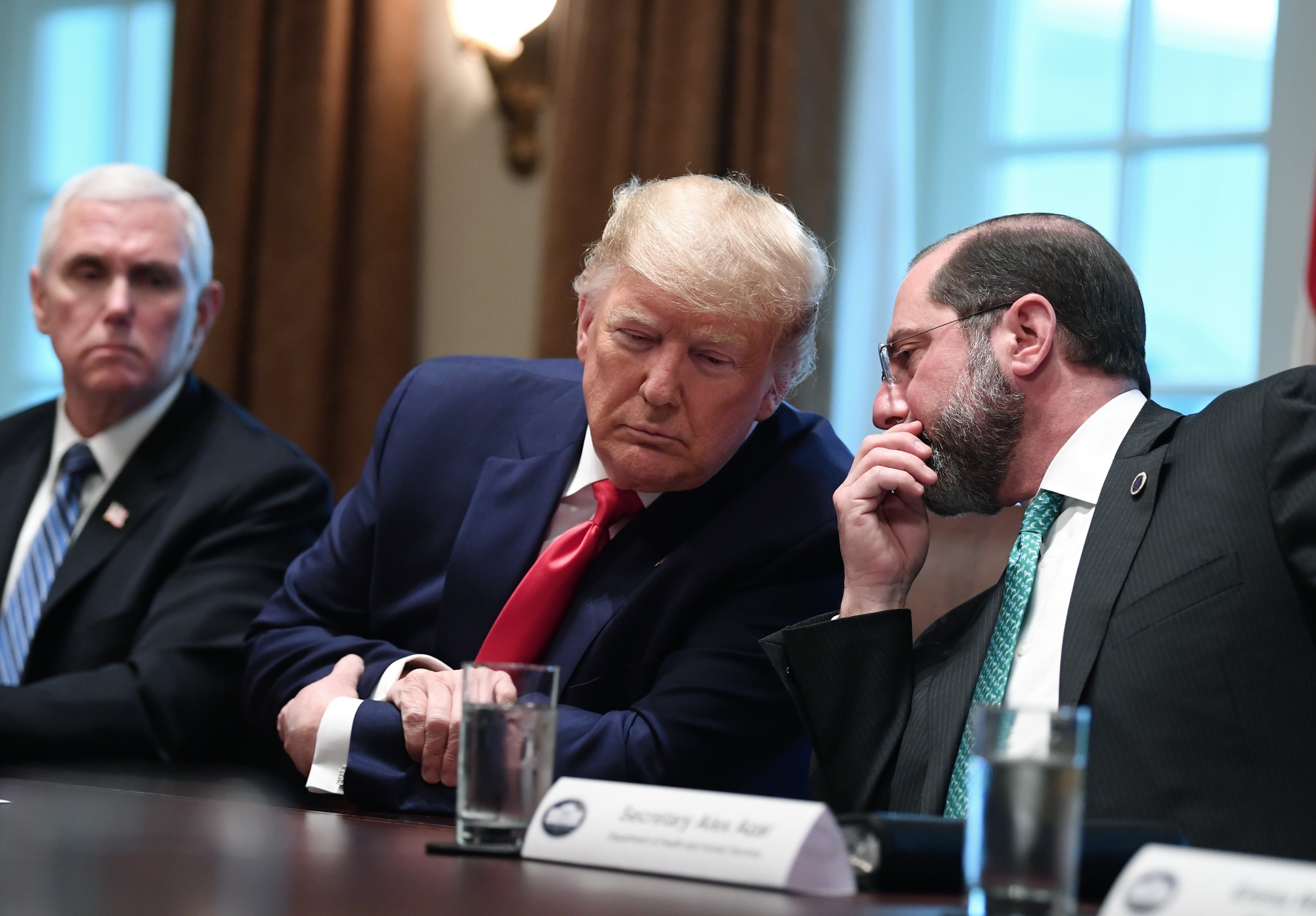 Alex Azar, secretary of Health and Human Services, speaks to Donald Trump during a meeting in Washington, D.C. on March 2.