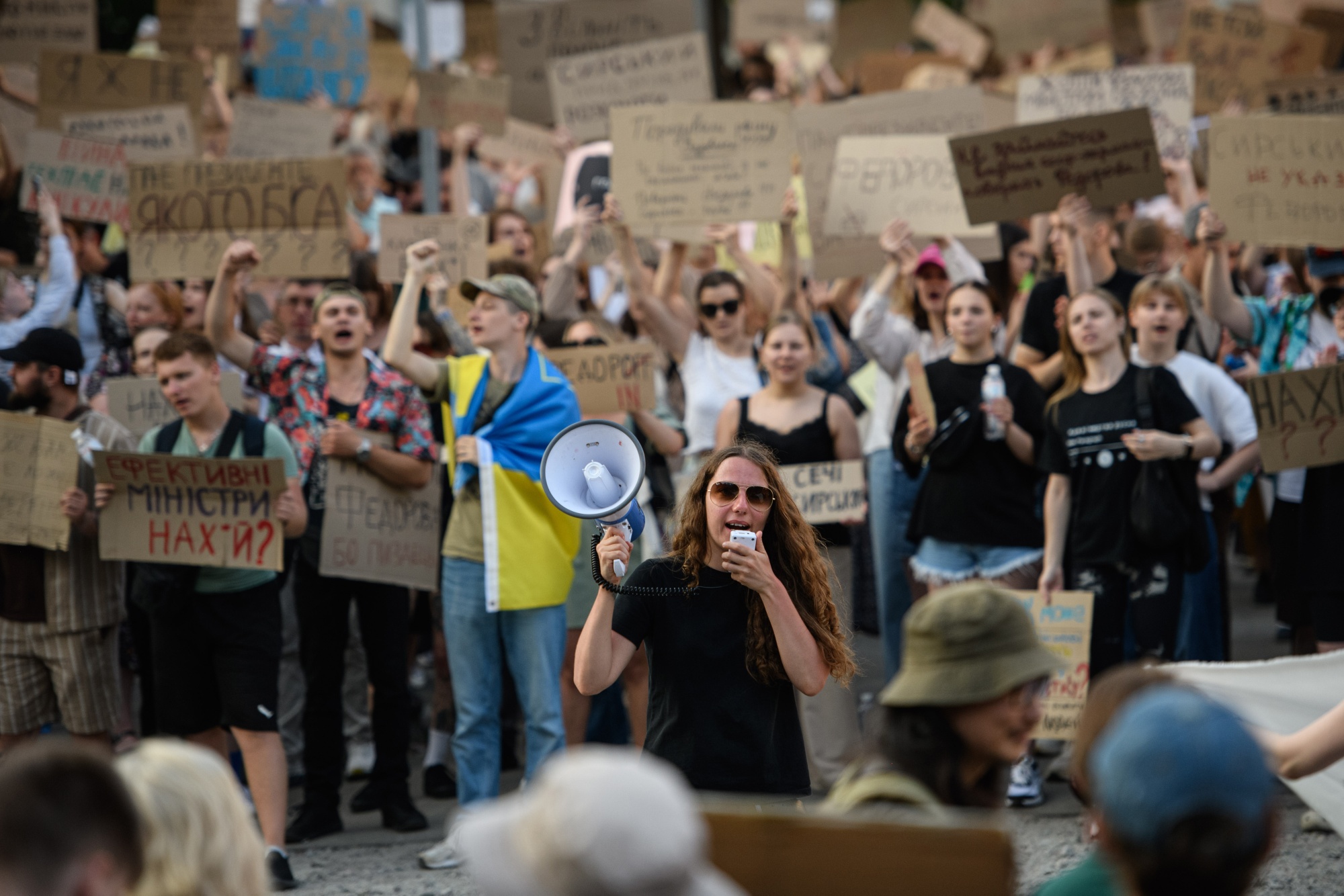 Protesters during a demonstration against the dismissal of Mykhailo Fedorov, Ukraine's defense minister, in Kyiv, Ukraine, on Thursday, July 16, 2026. The abrupt dismissal of Fedorov, a popular minister and one of the architects of Kyiv’s successful drone warfare, triggered street protests across the country and dismay among foreign allies. Photographer: Olga Ivashchenko/Bloomberg