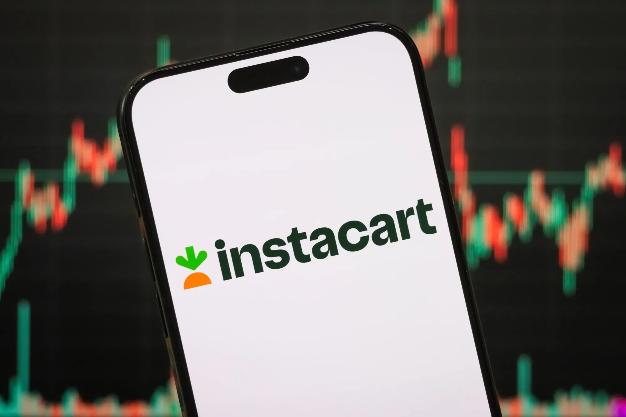 The logo of Maplebear Inc., doing business as Instacart, is arranged on a smartphone screen in Chongqing, China.