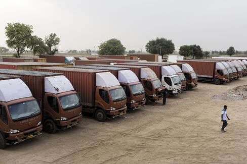Trucks sit parked at a Rivigo pitstop in Manesar.