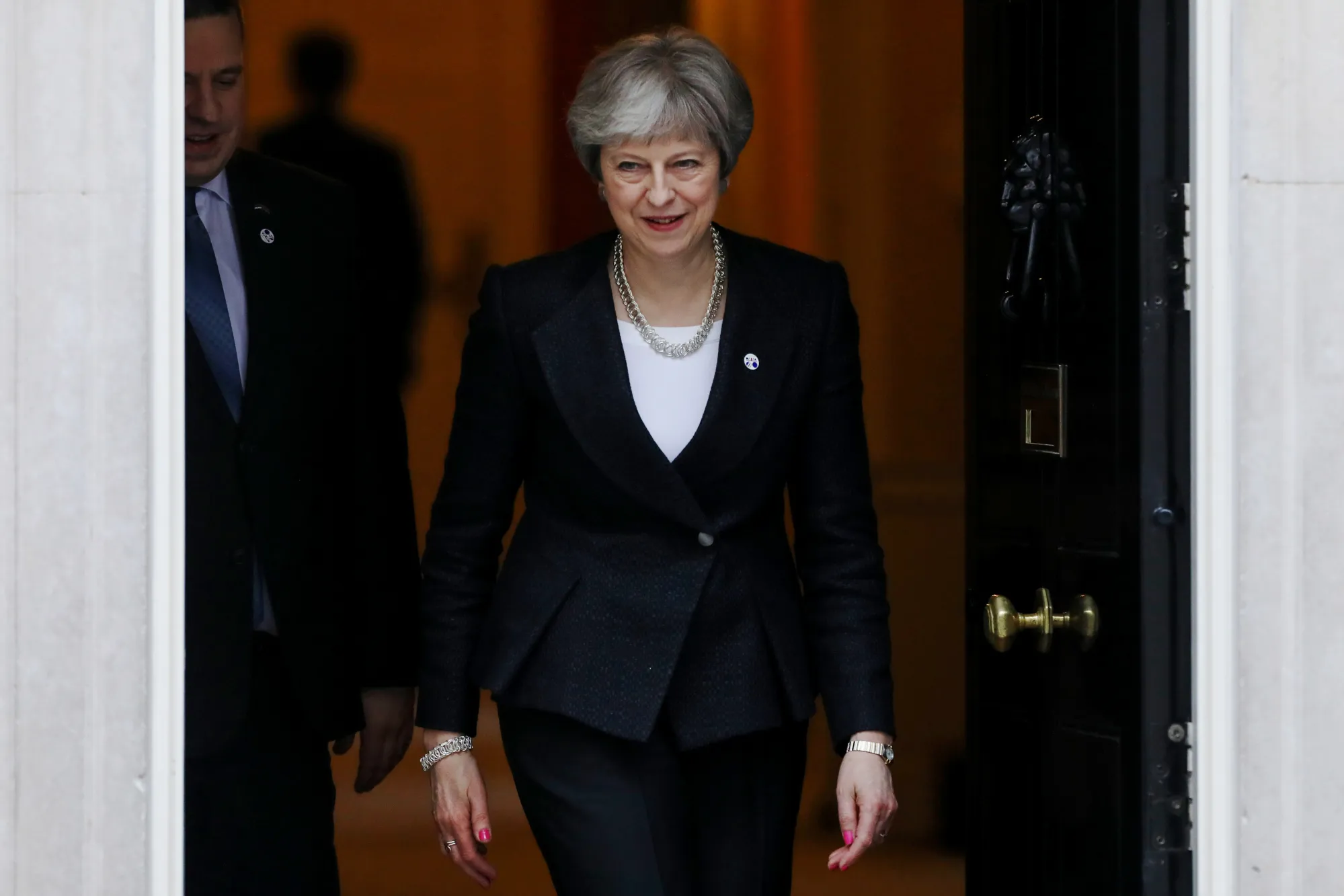 Theresa May leaves 10 Downing Street in London.