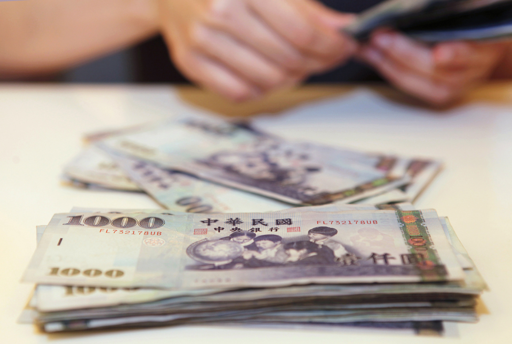 台湾ドル、アジア最良のキャリー取引通貨へ－中国人民元を抜く