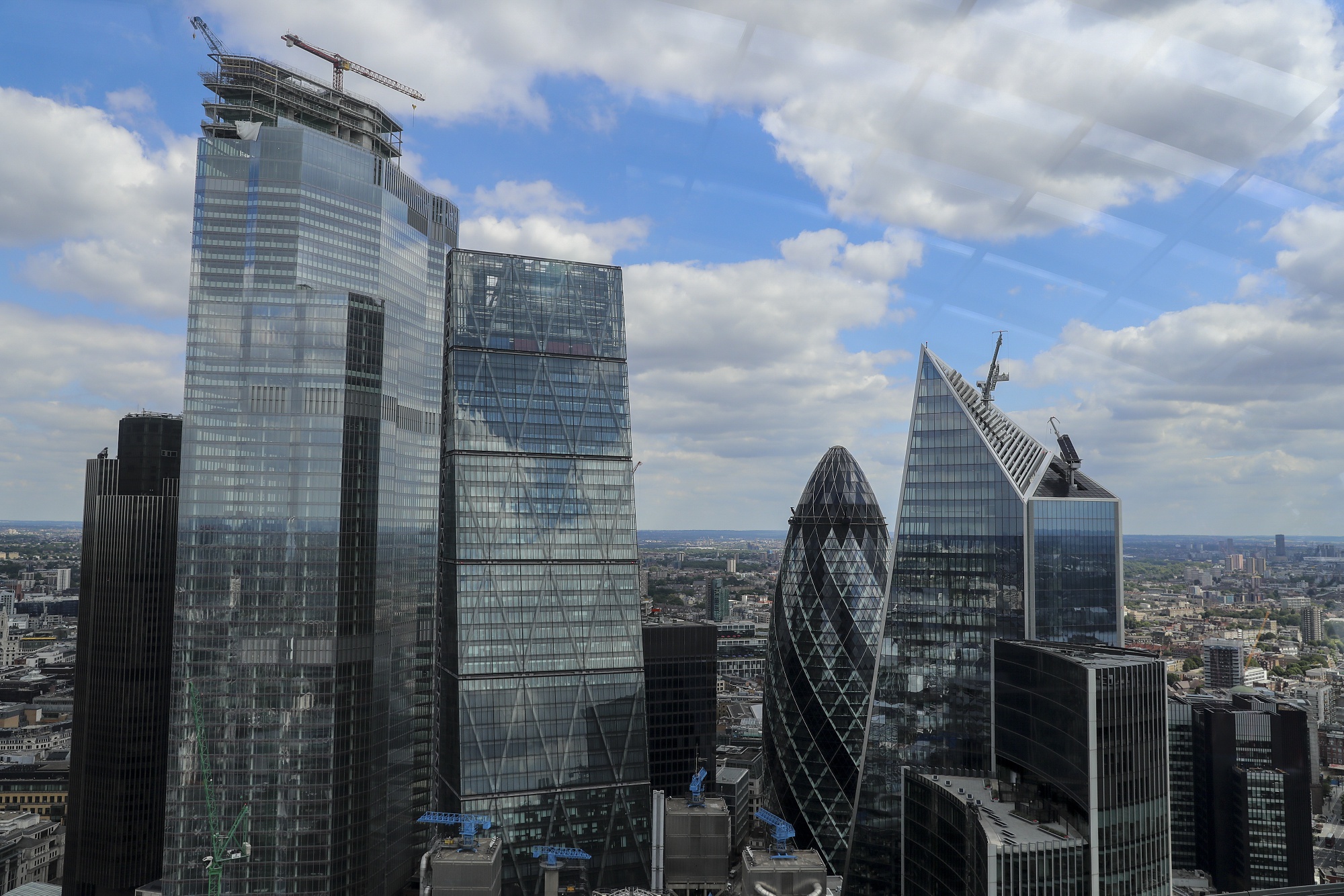Skyscrapers stand in the City of London's square mile financial district