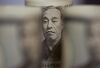 Japanese 10,000 yen banknotes are arranged for a photograph in Tokyo, Japan, on Monday, June 20, 2016.