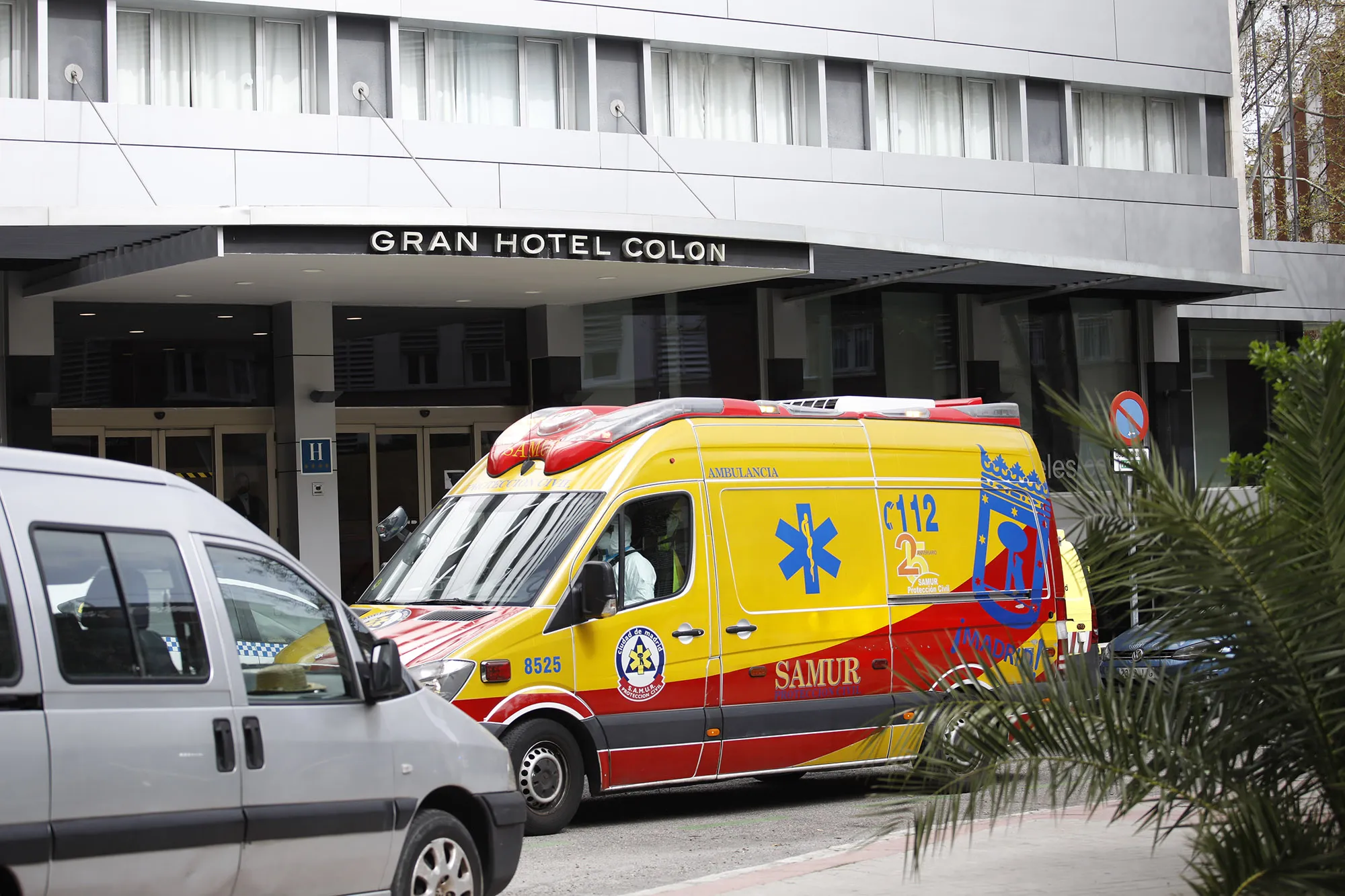 An ambulance parks in front of the Hotel Colon used as a hospital in Madrid.