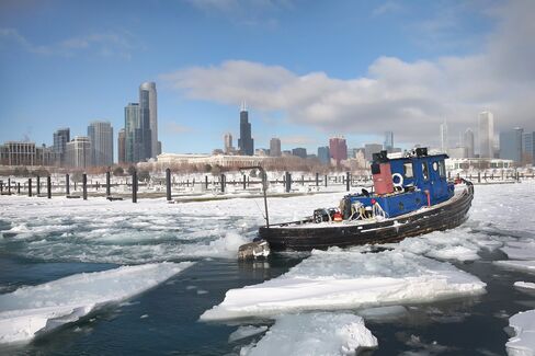 A Tugboat Breaks Up Ice in Chicago