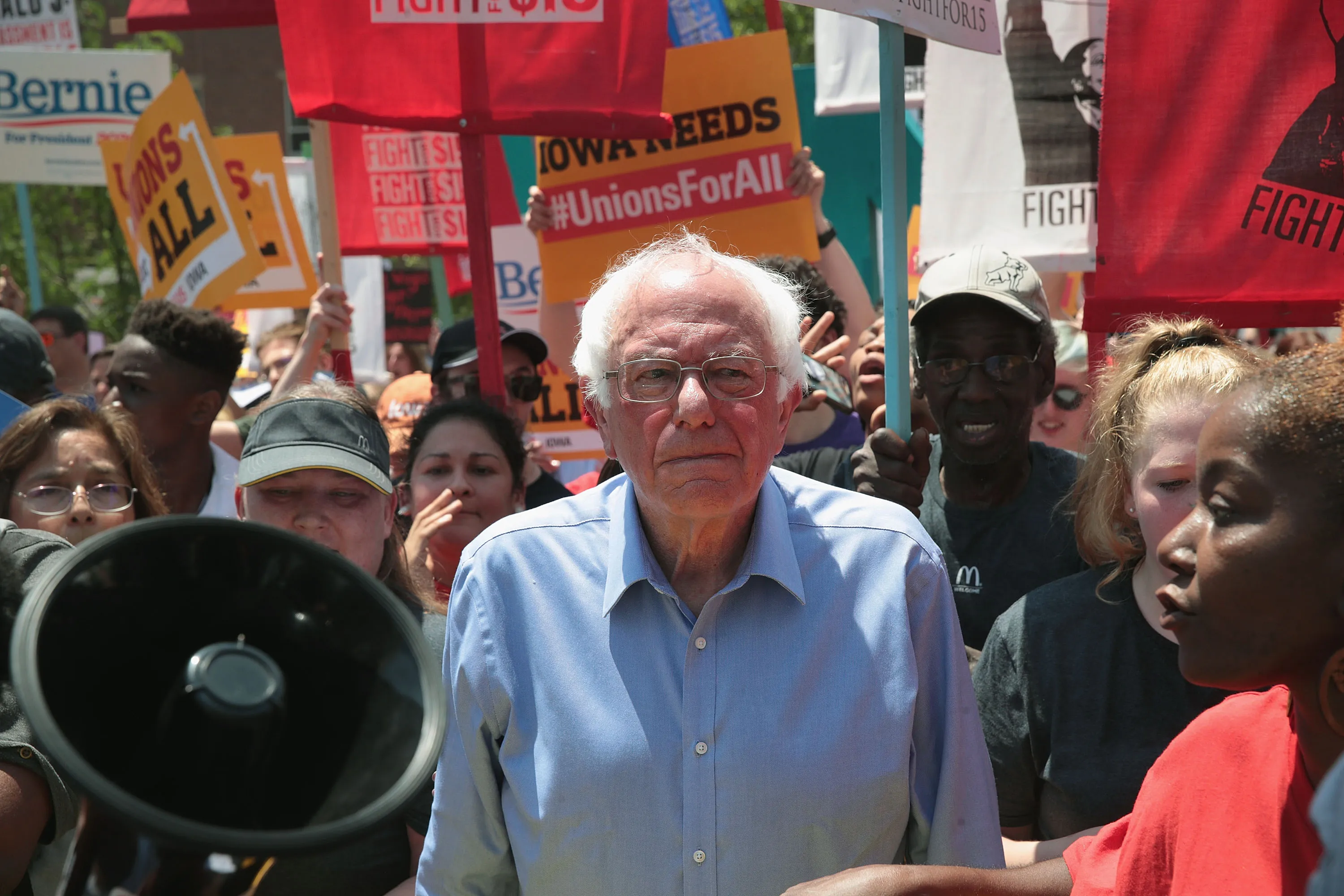 Bernie Sanders with Fight For $15 fast food workers in Iowa on June 9.