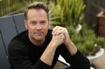 Actor Barry Watson poses for a portrait at his home in the Brentwood section of Los Angeles on Friday, Oct. 22, 2021, to promote a reboot of the Michael Landon TV series “Highway to Heaven,&quot; which co-stars Jill Scott as an angel sent to earth to help people. (AP Photo/Chris Pizzello)