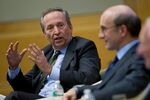 Larry Summers, left, at the Jacques Polak Annual Research Conference at the International Monetary Fund in Washington on Nov. 8