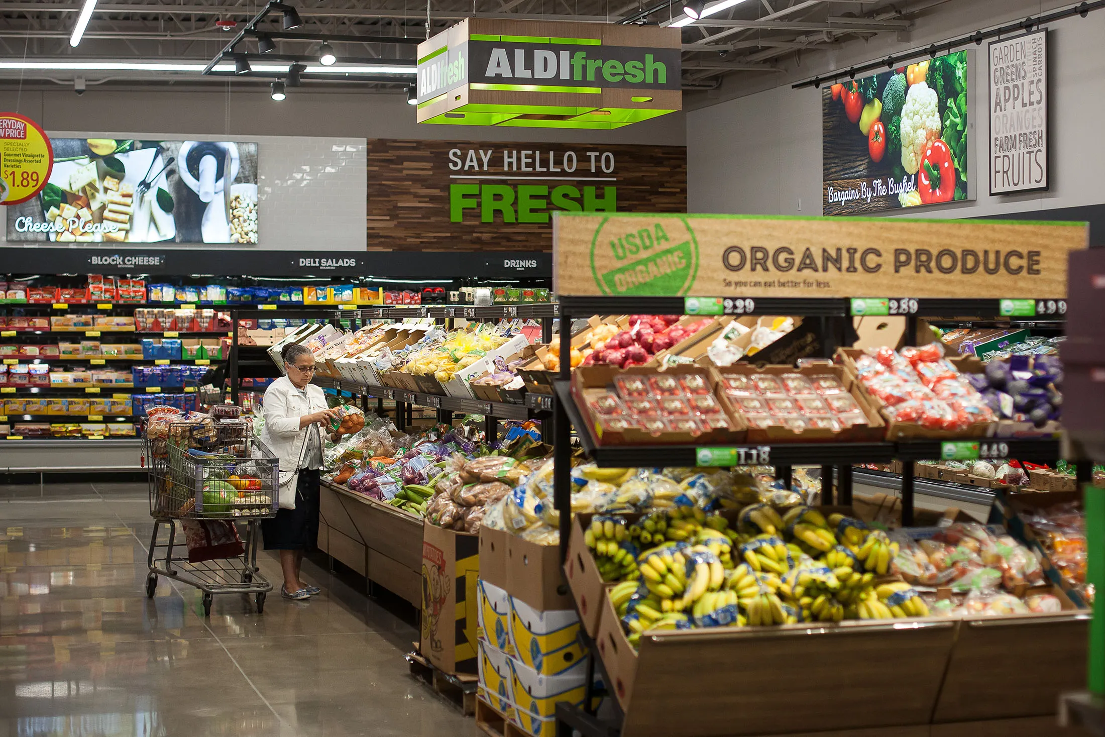 A customer shops at an Aldi Inc. grocery store in Hackensack, U.S., on Thursday, June 8, 2017.
