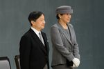 Japan's Emperor Naruhito, left, and Empress Masako stand during a memorial service marking the 74th anniversary of the end of World War II at Nippon Budokan in Tokyo, Japan.
