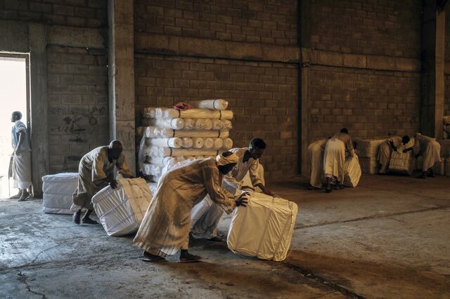 Bales of cotton being transported into a commercial warehouse in Port Sudan, on October 31.