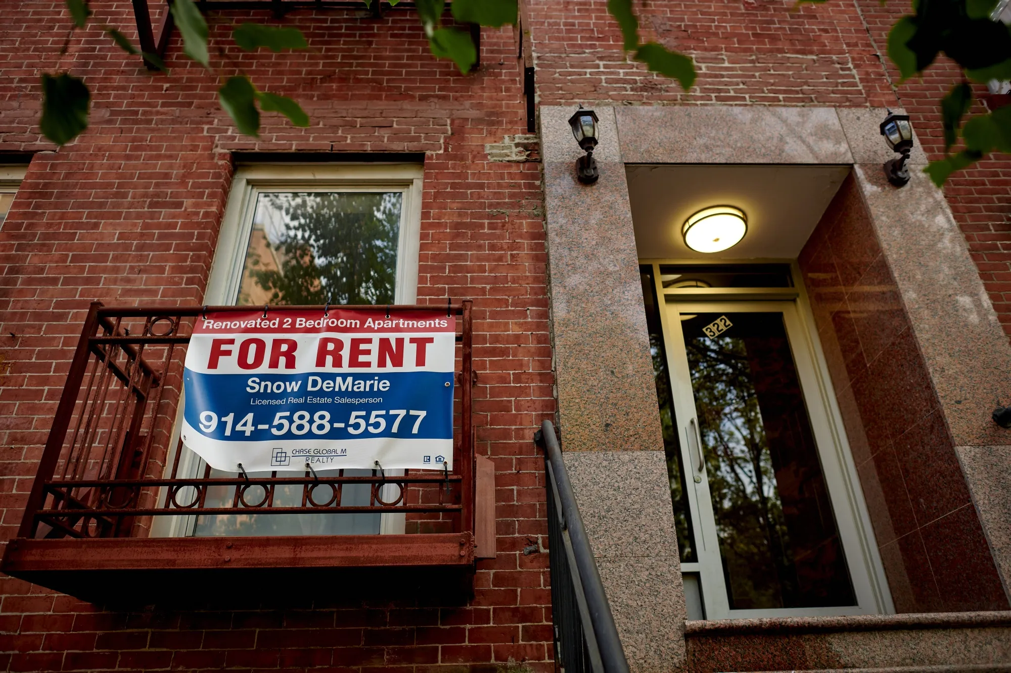 A "For Rent" sign outside an apartment building in the East Village neighborhood of New York.