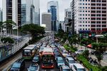Vehicles sit in traffic during rush hour in Jakarta.