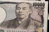 Japanese 10,000 yen banknotes are arranged for a photograph in Tokyo, Japan on Sunday April 14, 2019. U.S. Treasury Secretary Steven Mnuchin said he wanted a currency clause in a trade deal with Japan to prevent deliberate manipulation of the yen to bolster exports, Japanese public broadcaster NHK said.