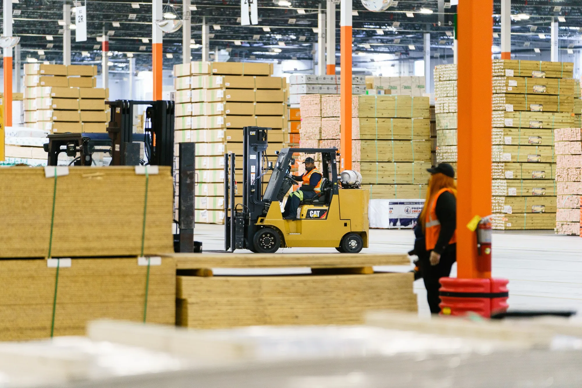 An employee operates a forklift inside a distribution center in Stonecrest, Georgia, U.S.&nbsp;