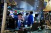 A trader works on the floor of the New York Stock Exchange (NYSE) in New York, U.S., on Monday, Oct. 15, 2018. U.S. stocks fell along with the dollar as political tensions added to a growing list of investor concerns.