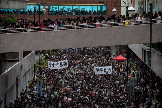 Dozens Arrested as Mass Hong Kong Rally Keeps Heat on Carrie Lam