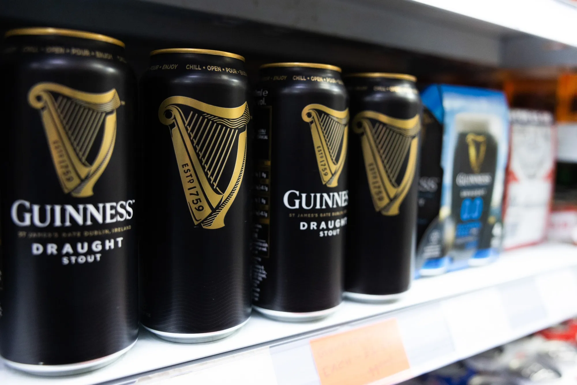 Cans of draught Guinness in a supermarket in Chelmsford, UK.