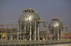 Storage tanks containing Natural Gas Liquids (NGL) stand at a facility in Saudi Aramco's Shaybah oilfield operates in Shaybah, in the Rub' Al-Khali (Empty Quarter) desert in Saudi Arabia on Tuesday, Oct. 2, 2018. Saudi Arabia is seeking to transform its crude-dependent economy by developing new industries, and is pushing into petrochemicals as a way to earn more from its energy deposits.