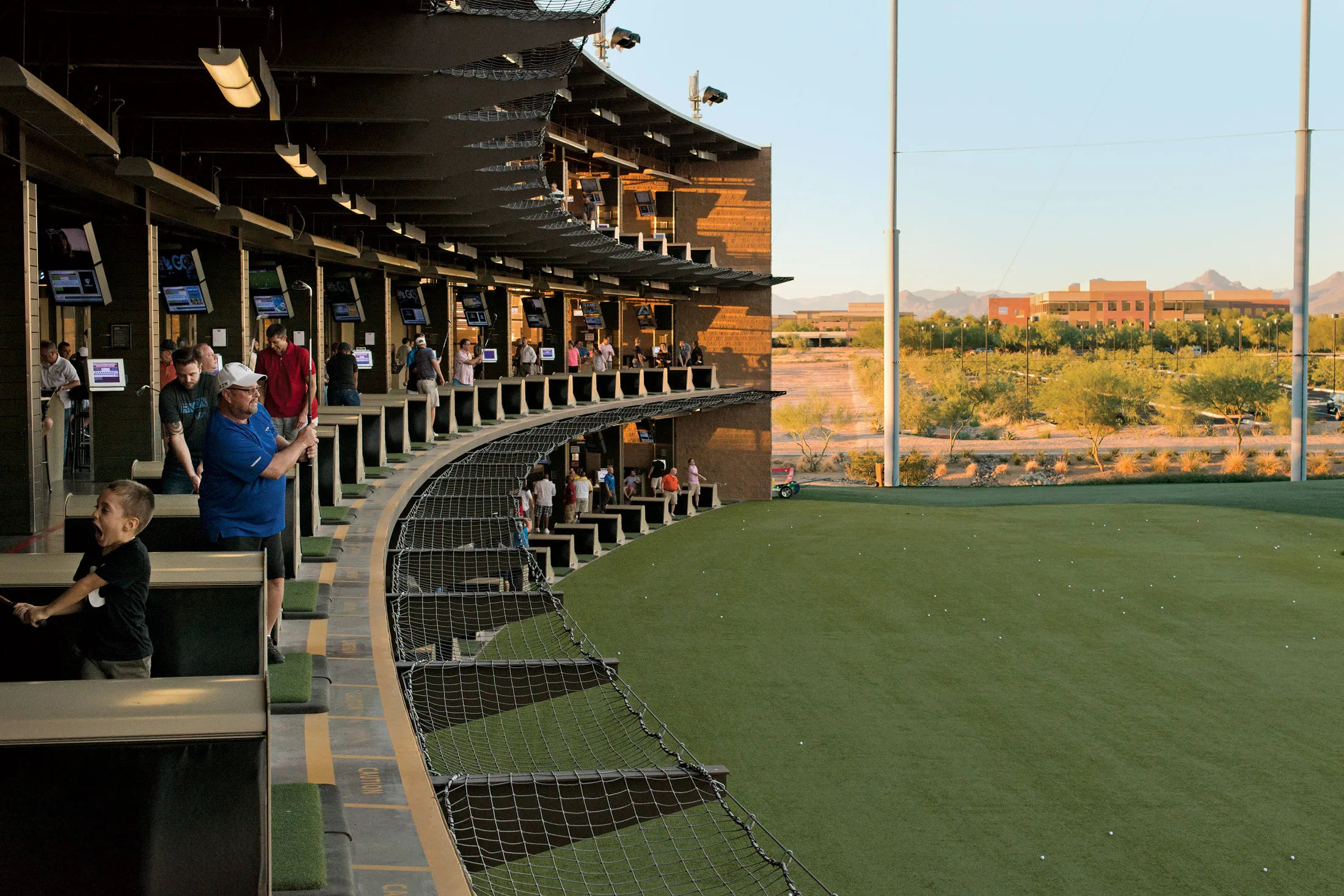 Patrons get their swings in at Topgolf in Scottsdale.
