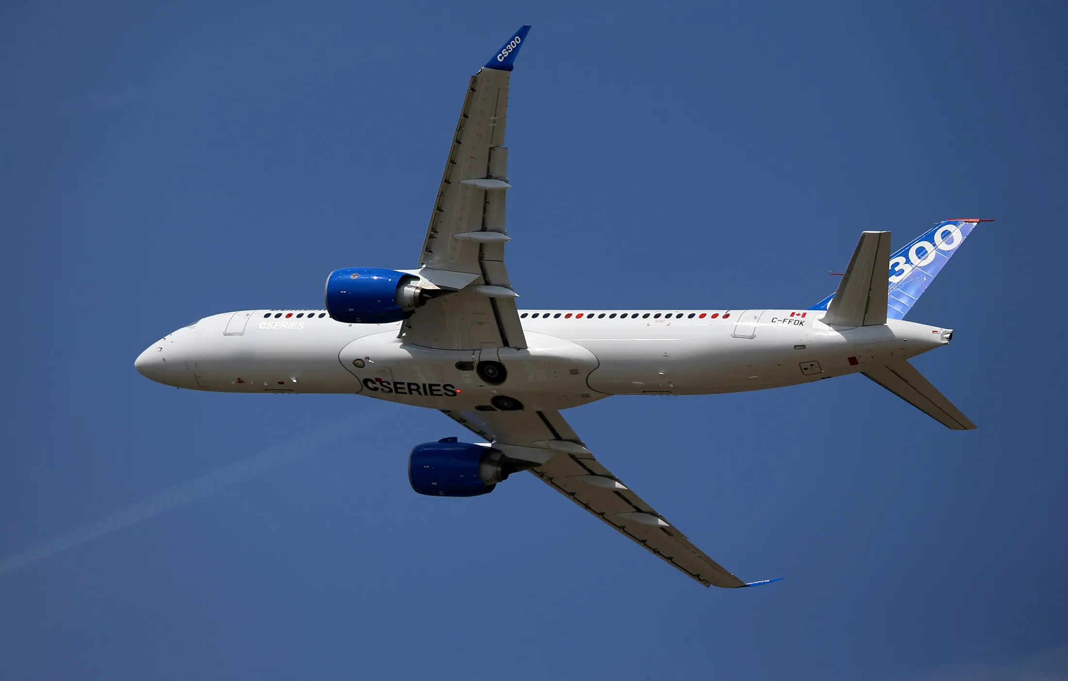 A Bombardier CS300 C Series aircraft, manufactured by Bombardier Inc., performs a flying display on day two of the 51st International Paris Air Show in Paris.
