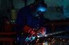 A worker uses a welding torch on an aluminum formwork part at a Tac System Formwork Bhd. facility in Selangor, Malaysia, on Tuesday, Nov. 13, 2018. Malaysia is scheduled to release third-quarter gross domestic product figures on Nov. 16.
