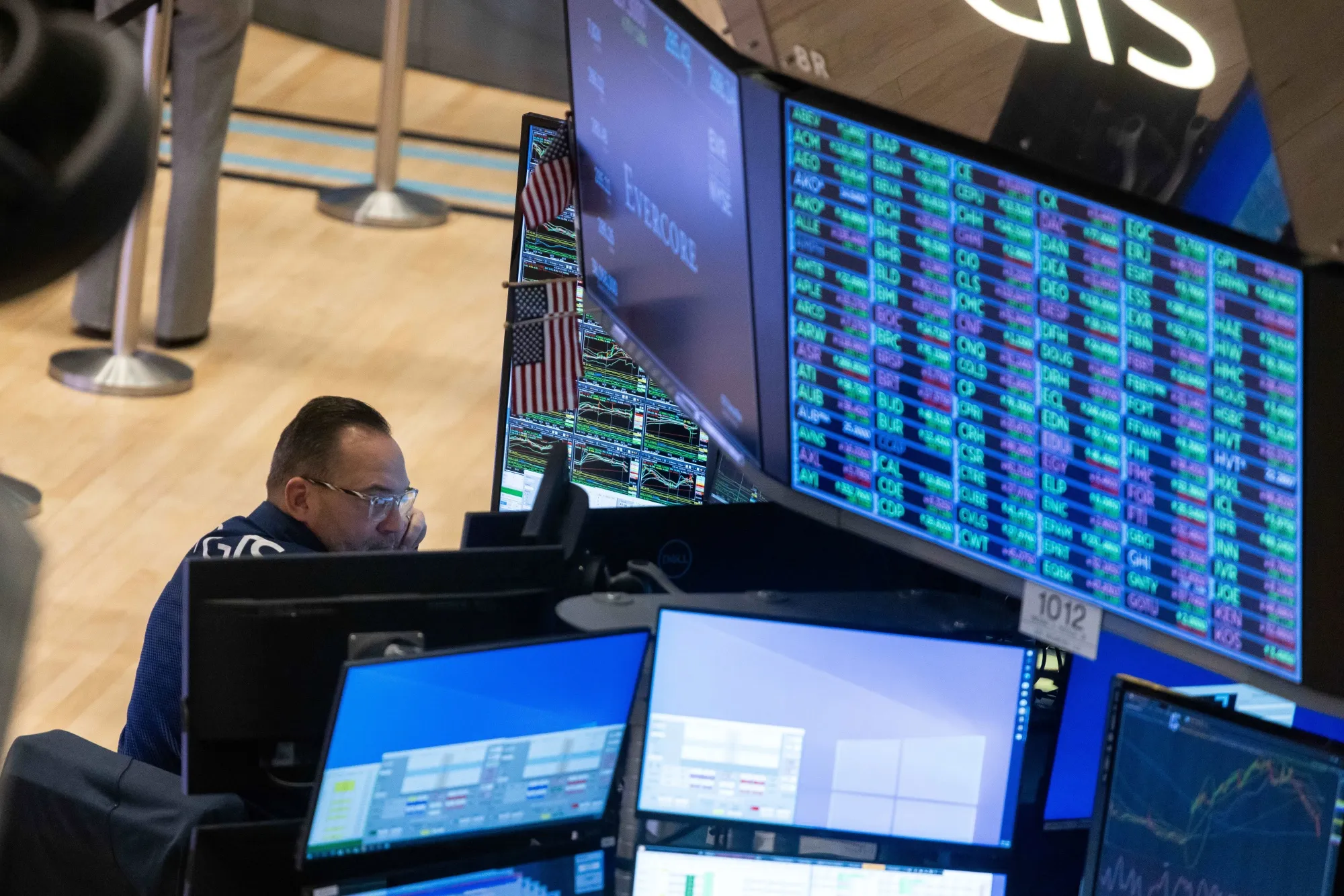 A trader works on the floor of the New York Stock Exchange.